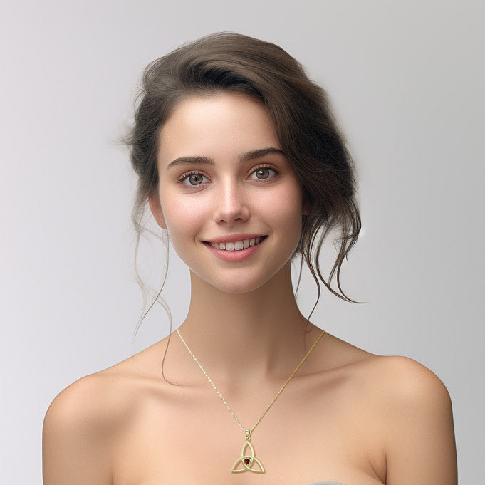 The Celtic Trinity Knot 14 K Yellow Gold Pendant with Heart Gemstone GPD5342